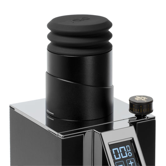 Close-up of the ARO Espresso Aluminum Single Dose Hopper installed on a Eureka Mignon grinder, showcasing the seamless design and bellows attachment for single-dose coffee grinding.