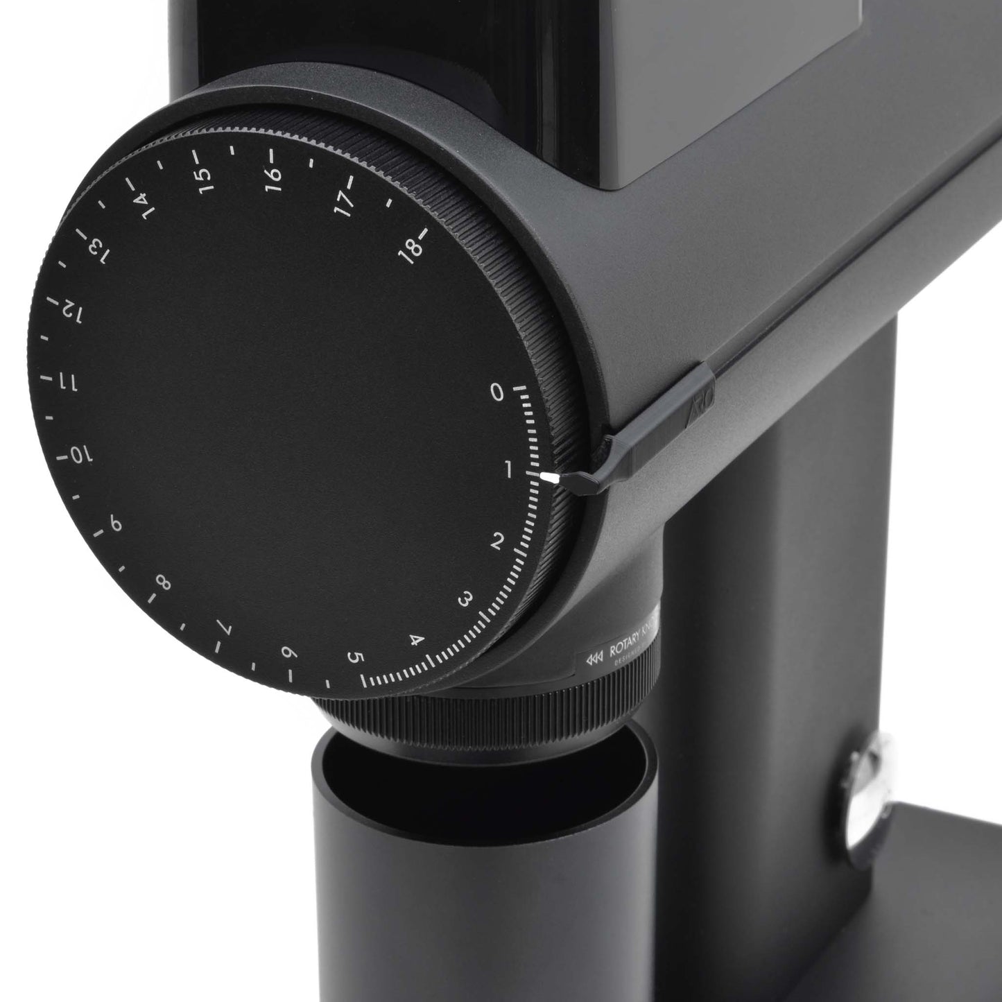 Angled front view of a Timemore Sculptor 078 espresso grinder dial with custom dial pointer attached.