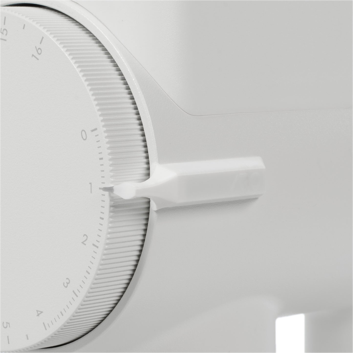 White ARO dial pointer installed on a white Timemore grinder body, aligned to the number one grind setting.
