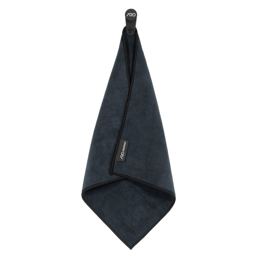 ARO Magnetic Coffee Bar Towel hanging from its removable magnetic hanger on a white background
