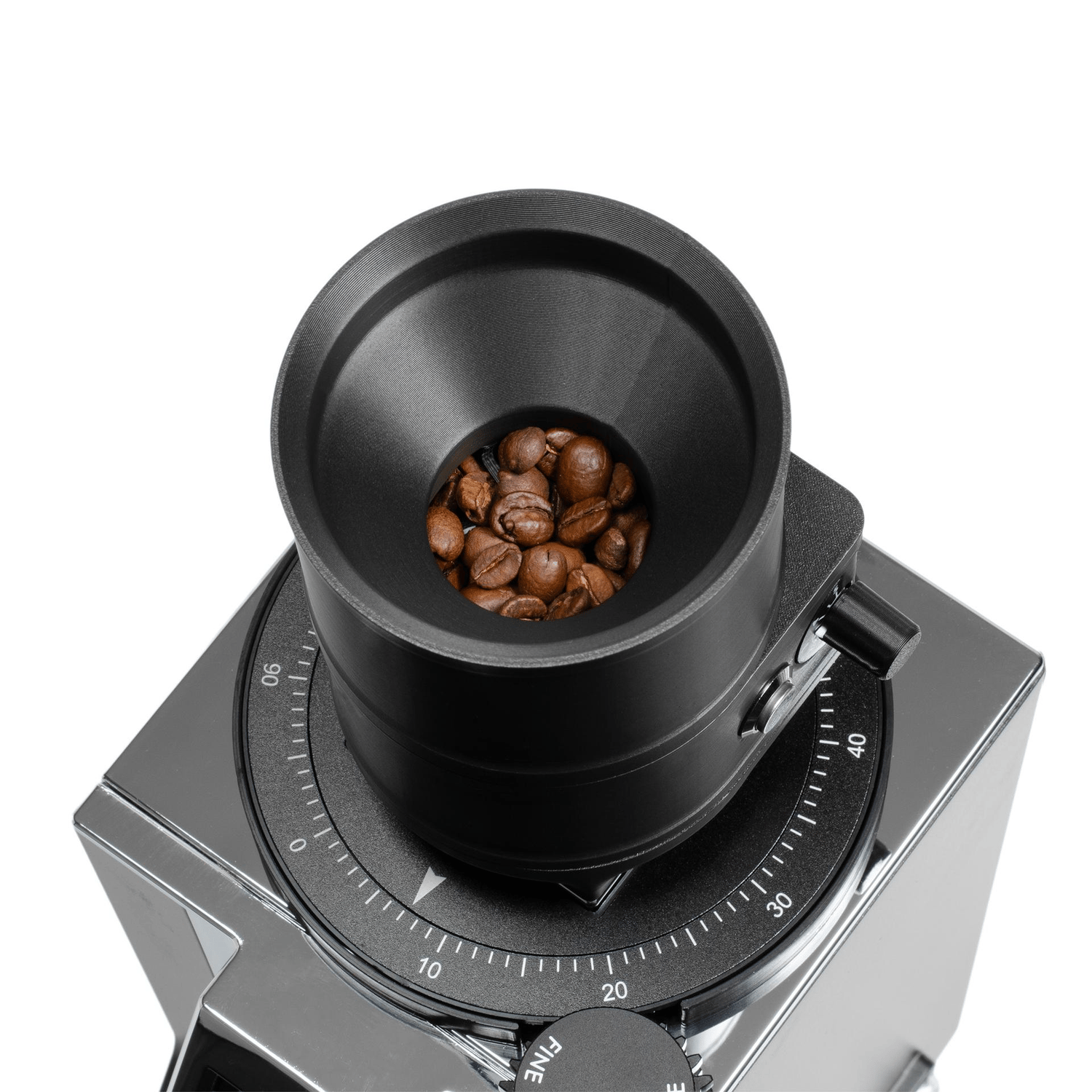 Moving collage showing coffee beans progressively feeding through the ARO Slow Feeder into the grinder, from full hopper to empty