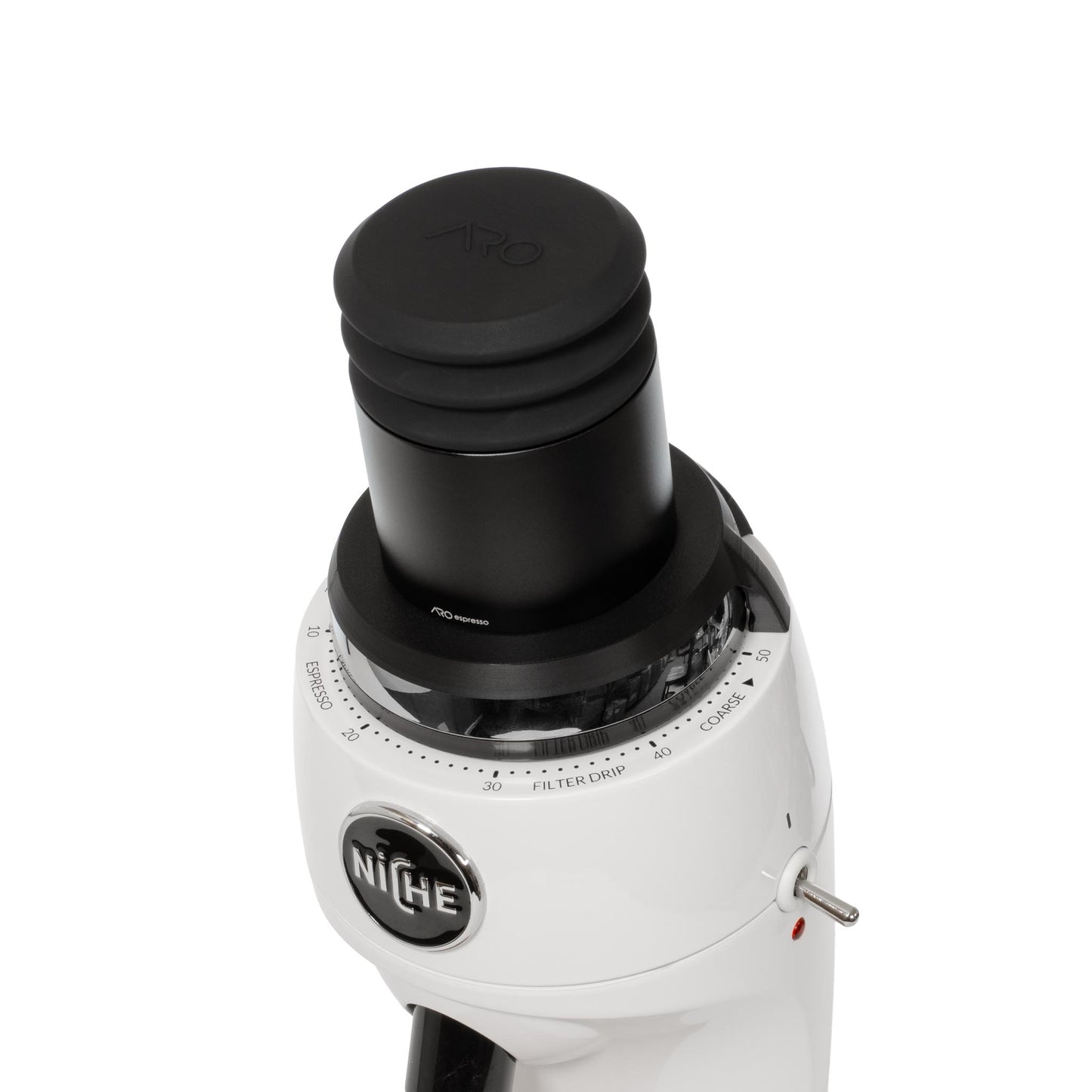 Close-up top view of black ARO aluminum single dose hopper and silicone bellows installed on a Niche Zero grinder