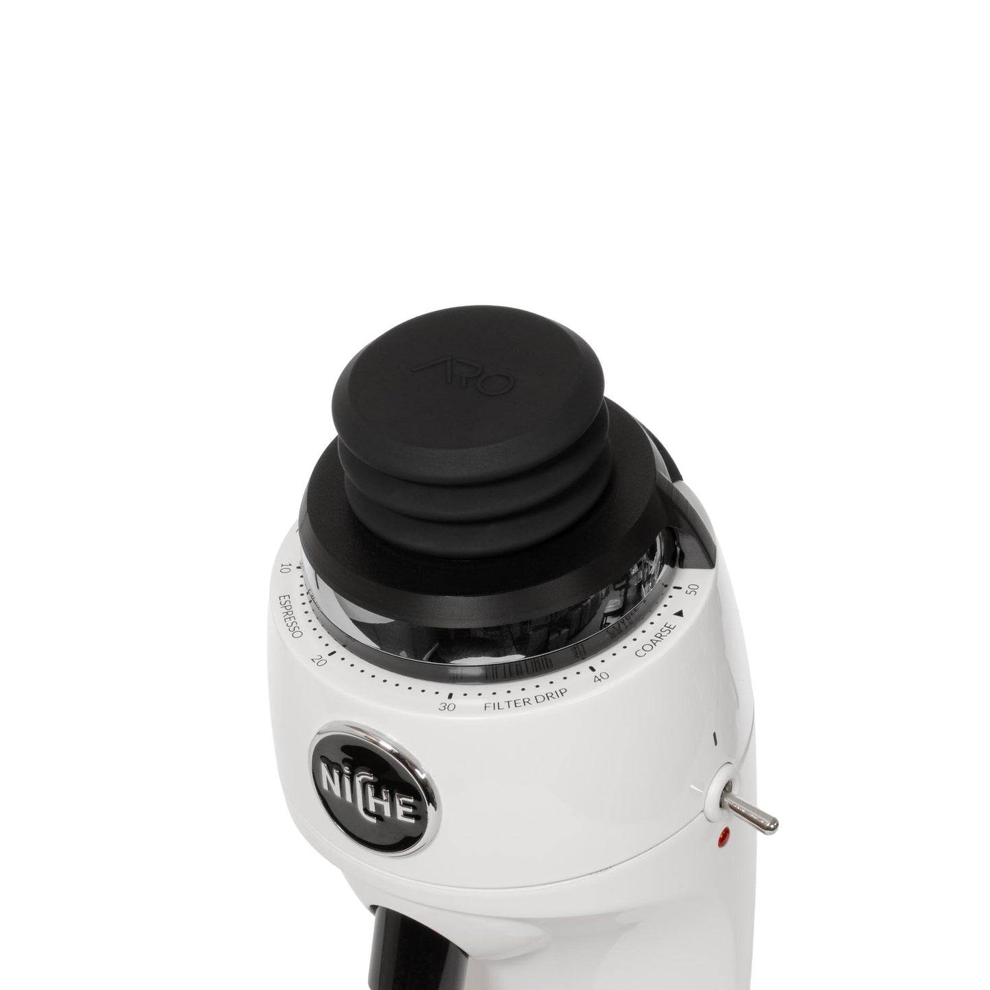 Close-up top view of black ARO silicone bellows installed directly on a white Niche Zero grinder for low-profile single dosing